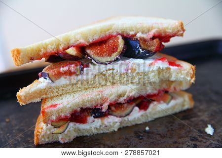 Fruit Sandwich With Cream Cheese And Jam, Cut In Half And Stacked