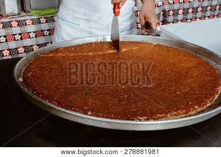 Turkish Desert Kunefe Being Cut By Chef In The View