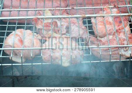 Preparation On Bbq. Dish With Roasted Meat On Abstract Background. Hot Tasty Smokey Barbecue Meal At