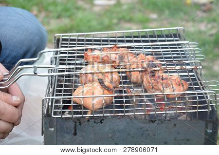 Preparation On Bbq. Dish With Roasted Meat On Abstract Background. Hot Tasty Smokey Barbecue Meal At