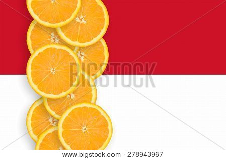 Indonesia Flag And Citrus Fruit Slices Vertical Row