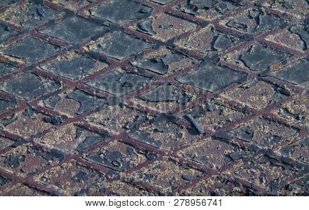 Old Latticed Metal Sheet With Peeling Paint.