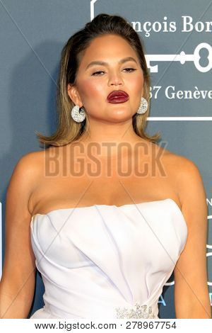 LOS ANGELES - JAN 13:  Chrissy Teigen at the Critics Choice Awards  at the Barker Hanger on January 13, 2019 in Santa Monica, CA
