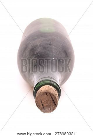 Old Bottle Of Wine, Covered In Dust, Selective Focus, Isolated On White