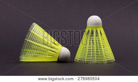 Close-up Of Two Shuttles Badminton, Isolated On Black Background