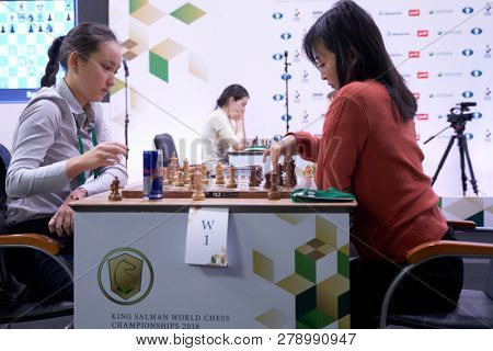 ST. PETERSBURG, RUSSIA - DECEMBER 28, 2018: Match World Champion Ju Wenjun, China (rightt) vs Zhansaya Abdumalik, Kazakhstan during World Rapid Chess Championship 2018. The match ended in a draw