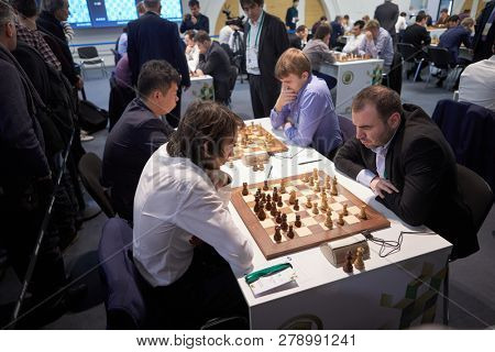 ST. PETERSBURG, RUSSIA - DECEMBER 27, 2018: Men compete in King Salman World Rapid Chess Championship 2018. In front Shakhriyar Mamedyarov, Azerbaijan (right) vs Gigoriy Oparin, Russia