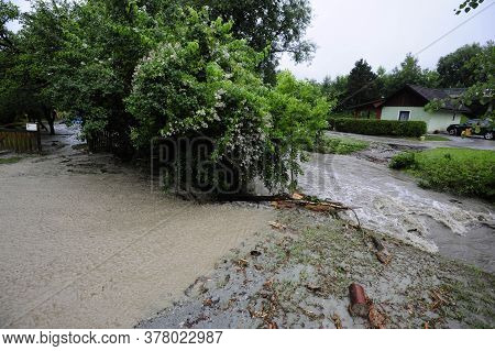 Building In A Flooded Area After Heavy Rainfalls, Muddy Water