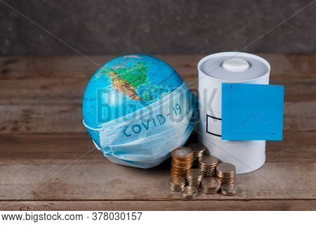 Financial Crisis Of Oil On The Planet Associated With The Epidemic. Globe With A Bandage And A Barre