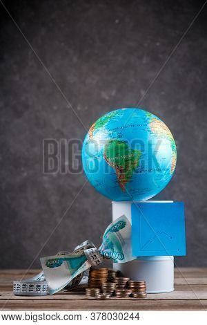 Financial Crisis Of Oil On The Planet Associated With The Epidemic. Globe With A Bandage And A Barre