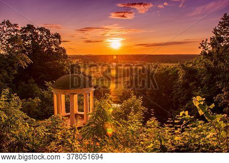 Old Pavilion In A Picturesque Location With Green Trees And Sun Shining. Sednev.ukraine