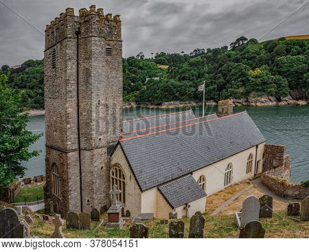 26 July 2018 - Dartmouth, Devon, Uk: St Petrox Church At The Mouth Of The River Dart Is The Oldest O
