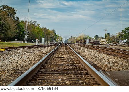 Jesup, Ga - March 17, 2018: Double Train Tracks Carry Freight And Passenger Trains Through The Cente