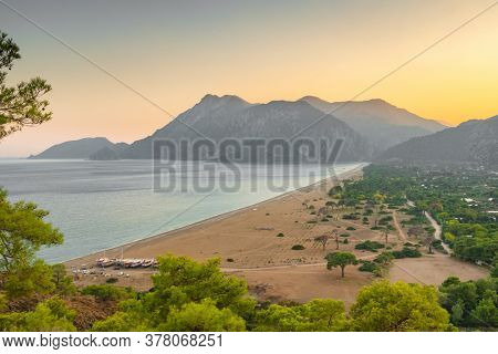 Beautiful sunset view of the Cirali Olympos beach at Mediterranean sea, Antalya Province, Turkey
