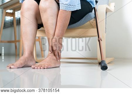 Ankle Leg Pain Of Senior Woman At Home, Healthcare Problem Of Senior Concept