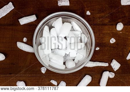 Top View Of White Cool Dry Ice (frozen Carbon Dioxide) With Smoke Effect In The Glass Bowl On The Da