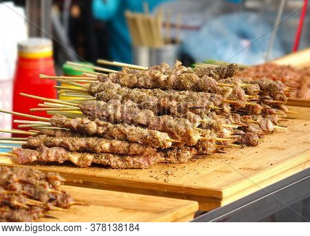 A Street Food Stall In Taiwan Offers Meat Skewers With Mideast Spices