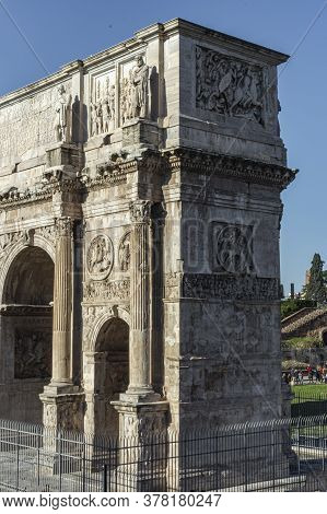 Rome, Italy, 25.12.2019: Arch Of Costantine In Rome In Cloudy Day With Tourist