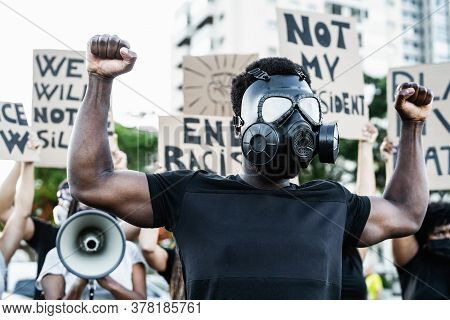 Activist Wearing Gas Mask Protesting Against Racism And Fighting For Equality - Black Lives Matter D