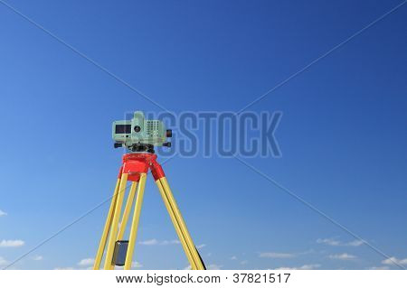 Geodesist Taking Measurement