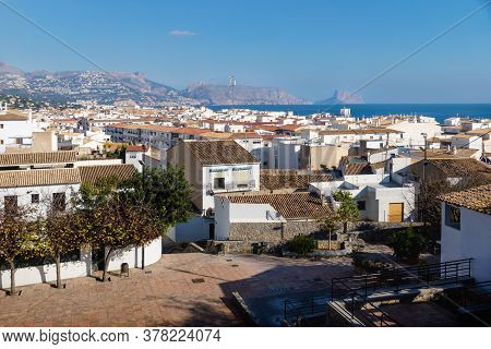 Outlook At The Old Town Square Placa Laigua With Sunny View Over Skyline And Ocean With Mountains An