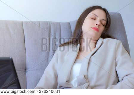 Portrait Of Tired Woman Sleeping Working On Laptop Sitting On Couch At Home, Distant Work. Overtime 
