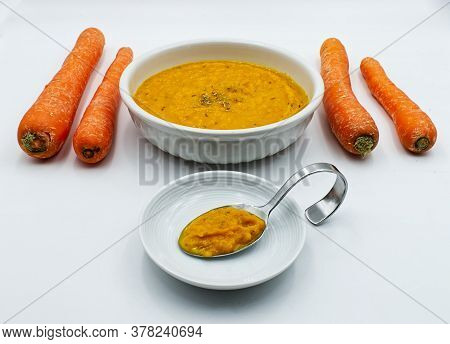 Carrot Cream Soup (vellutata Di Carote) Isolated On White Background