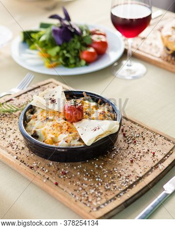 Tasty Fried Egg With Tomato, Vegetable Breakfast On The Wooden Plate