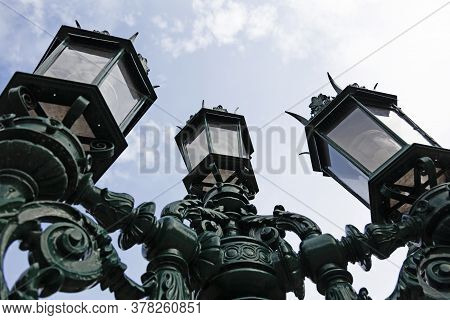 Old And Decorative Lamppost With Three Arms In Sundsvall