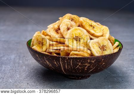 Healthy Sweet Snack, Crispy Dehydrated Unsugared Banana Chips In Bowl