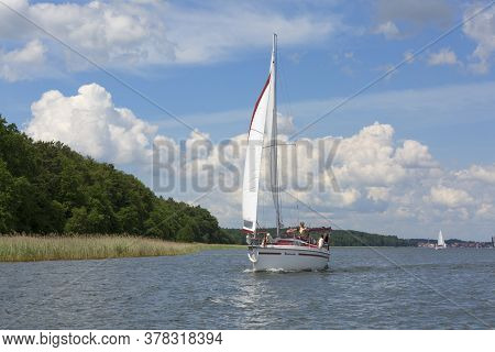 Masuria, Poland - June 24, 2020 : Lake In Polish Masuria, Sailing Yachts On A Sunny Day