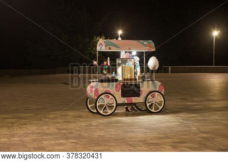 Kiev, Ukraine: 16 July, 2020 - Street Cotton Candy Cart Or Shop With Swetness And With Seller. Young