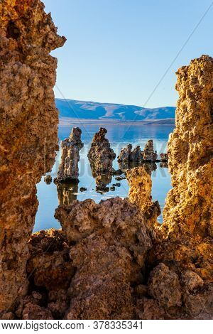 Picturesque Mono lake. Twilight evening. The columns-remains of 