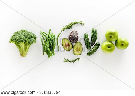 Greeny Cocktail Ingredients. Background. Сucumber, Avocado, Broccoli, Beans, Leek And Fresh Apple On