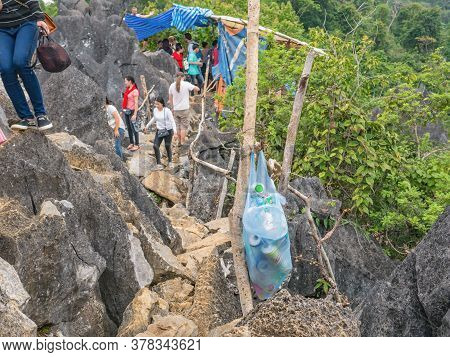 Vangvieng/lao-10 Dec 2017:unacquainted Tourist On Mountain Peak Of Pha Ngeun In Vangvieng City Laos.