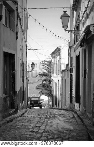 Old street in Icod de los Vinos town, Tenerife, Canary Islands. Black and white urban photography