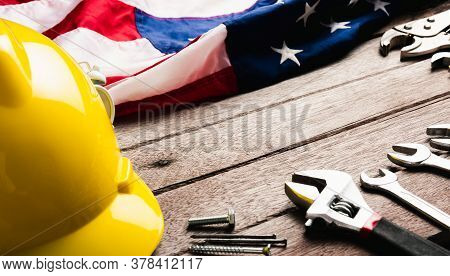 Usa Labor Day Concept, Top View Flat Lay Of Different Kinds Wrenches With American Flag On Wood Tabl
