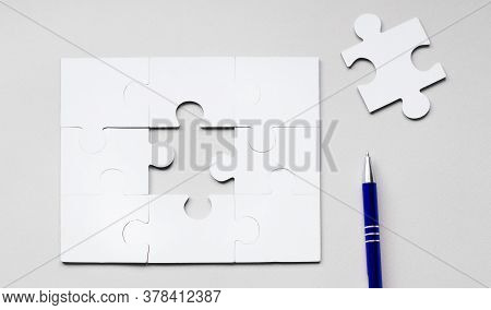 Fill The Missing Parts Fragment Of White Jigsaw Concept Puzzle For Business With Completing The Team