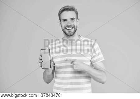 Mobile Services. Free Internet. Application Smartphone. Download And Start Play. Man Pointing At Sma