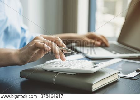 Young Women Do Income And Expense Accounting. In Order To Control Unnecessary Expenses.