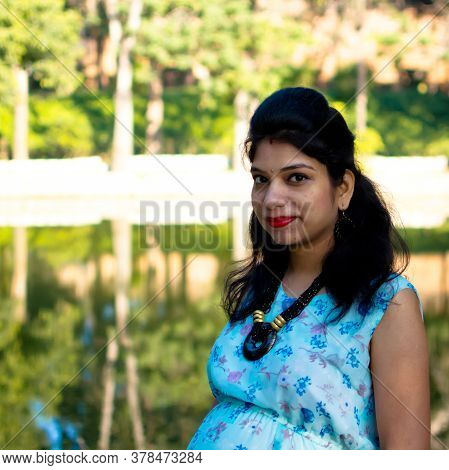Maternity Shoot Pose For Welcoming New Born Baby In Lodhi Road In Delhi India, Maternity Photo Shoot