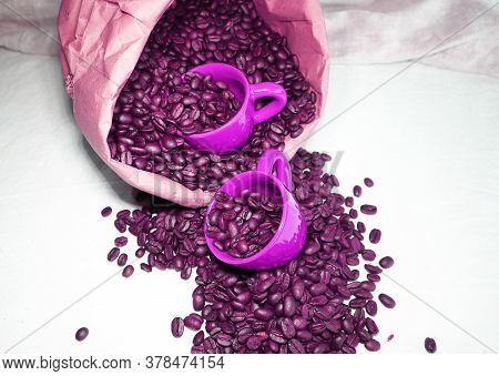Pink Espresso Cups With Coffee Beans Ans A Paper Bag