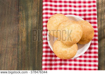 Delicious Almojabana Colombian Preparation - Wooden Background