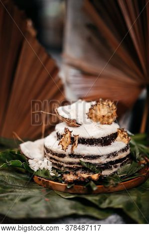 Brazilian Traditional Dessert: Sweet Couscous Tapioca Pudding Cuscuz Doce With Coconut On Wooden Boa