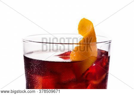 Boulevardier Cocktail And Orange Zest Isolated On White Background. Close Up