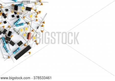 Various Electronic Components On White Background With Copy Space. Close-up, Top View
