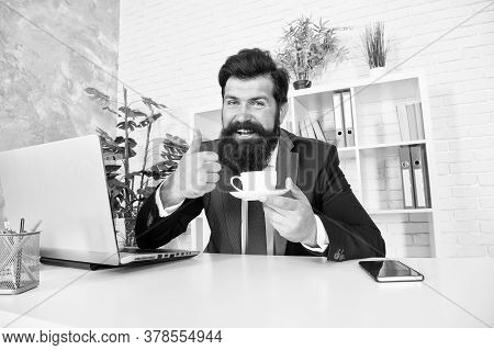 Best Tea. Realtor Give Thumbs Up With Tea Cup. Lawyer Drink Tea In Office. Bearded Man Enjoy Tea Bre