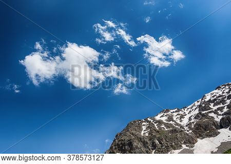 Dyllic Summer Landscape With Hiking Trail In The Mountains With Beautiful Blue Sky And Clouds.