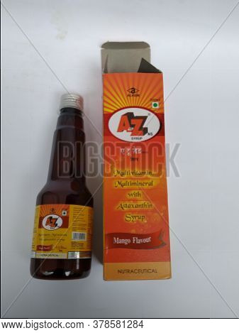 Closeup Of A To Z Ns Multi Vitamin And Mineral, Mango Flavour 200 Ml Syrup Bottle And Pack Isolated