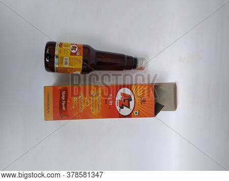 Closeup Of A To Z Ns Multi Vitamin And Mineral, Mango Flavour 200 Ml Syrup Bottle And Pack Isolated
